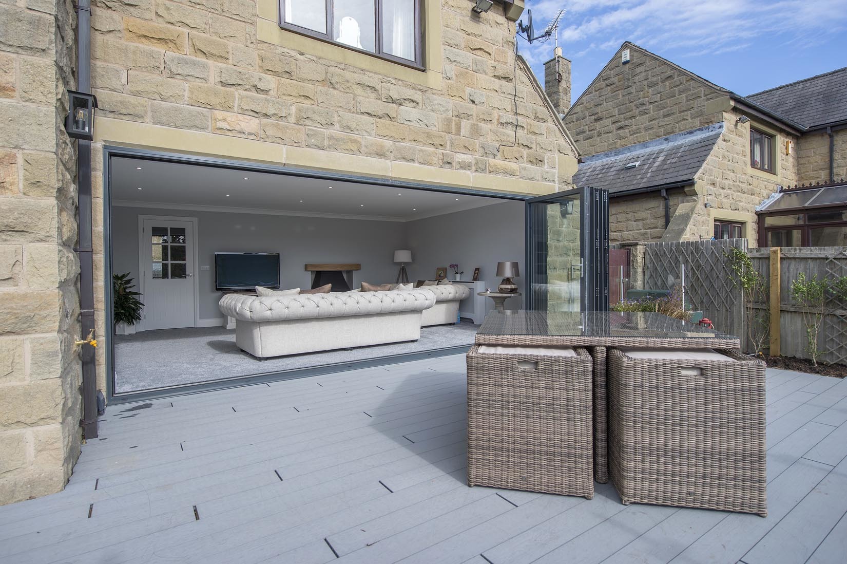 Bifold doors lead from the living room on to the refurbished terrace