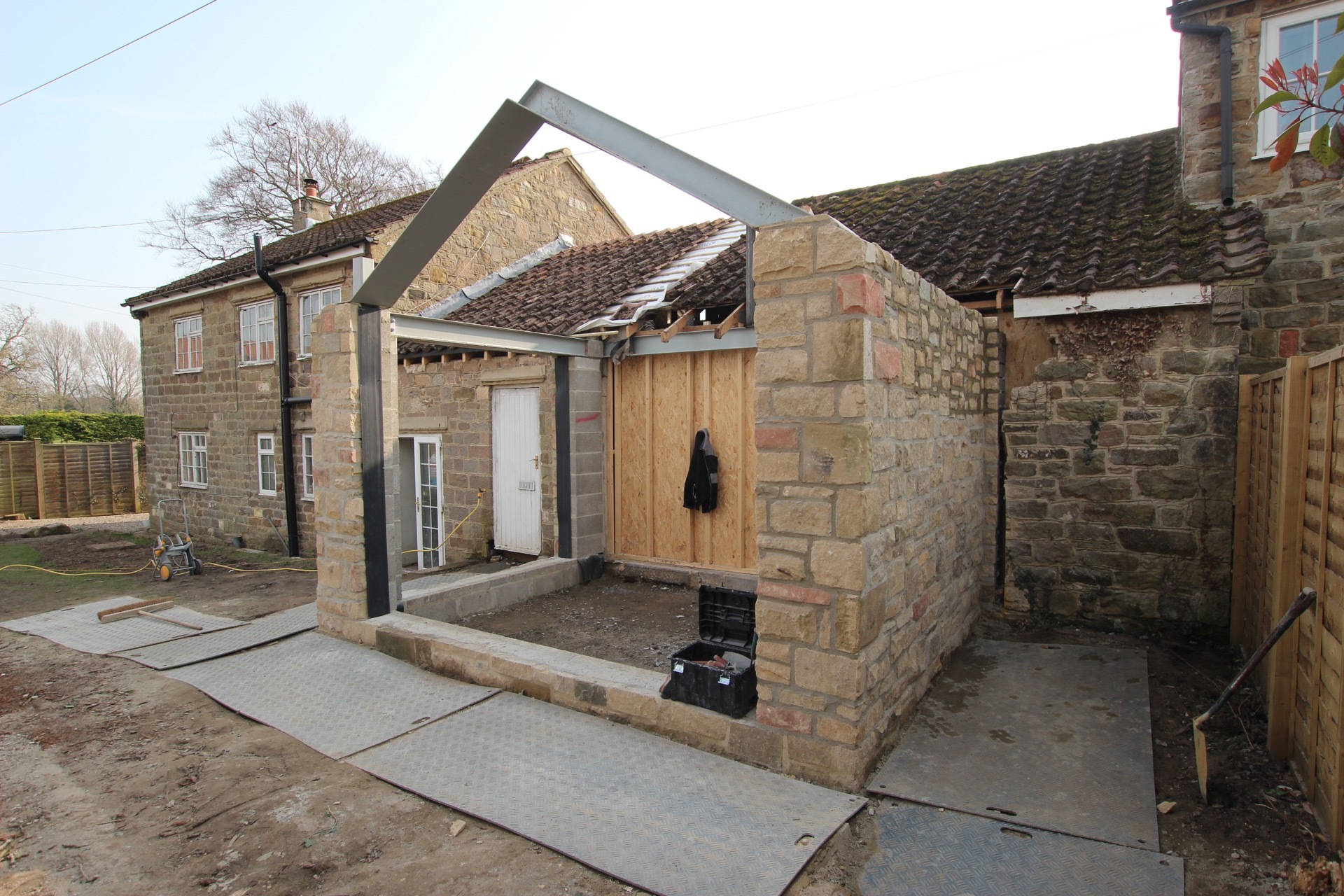 Stone & blockwork complete and steels in place for extension